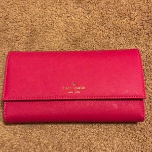 Kate spade wallet and magnetic iPhone 7 case.
